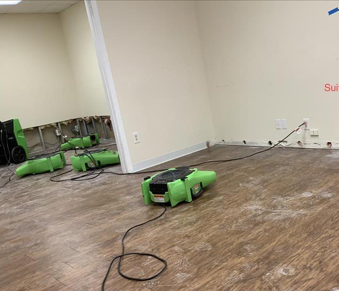 corporate suit office water damage flood floors florida west hollywood